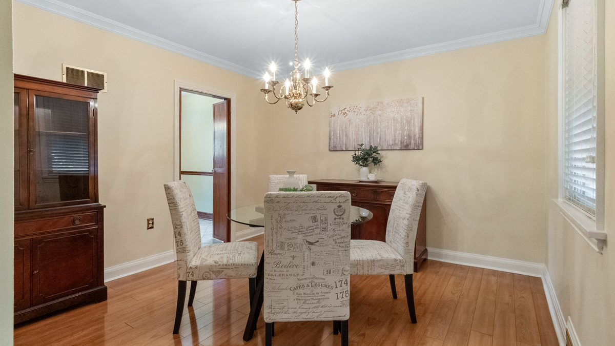 Dining room with door into kitchen thumbnail