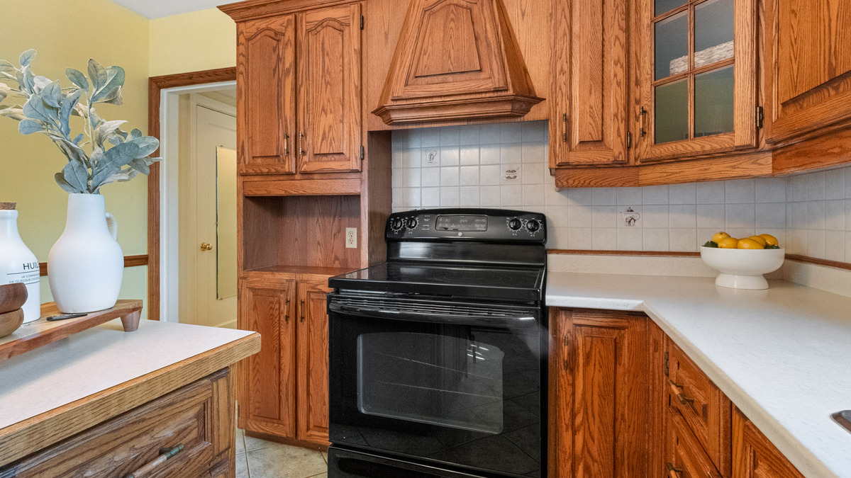 Kitchen with wood cabinets thumbnail